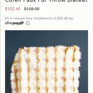 Anthropologie faux fur blanket, coran style